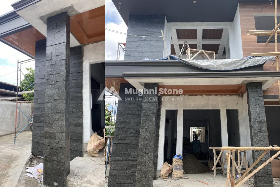 Pilar batu basalto warna hitam pada rumah industrial modern dengan tampilan kokoh dan maskulin