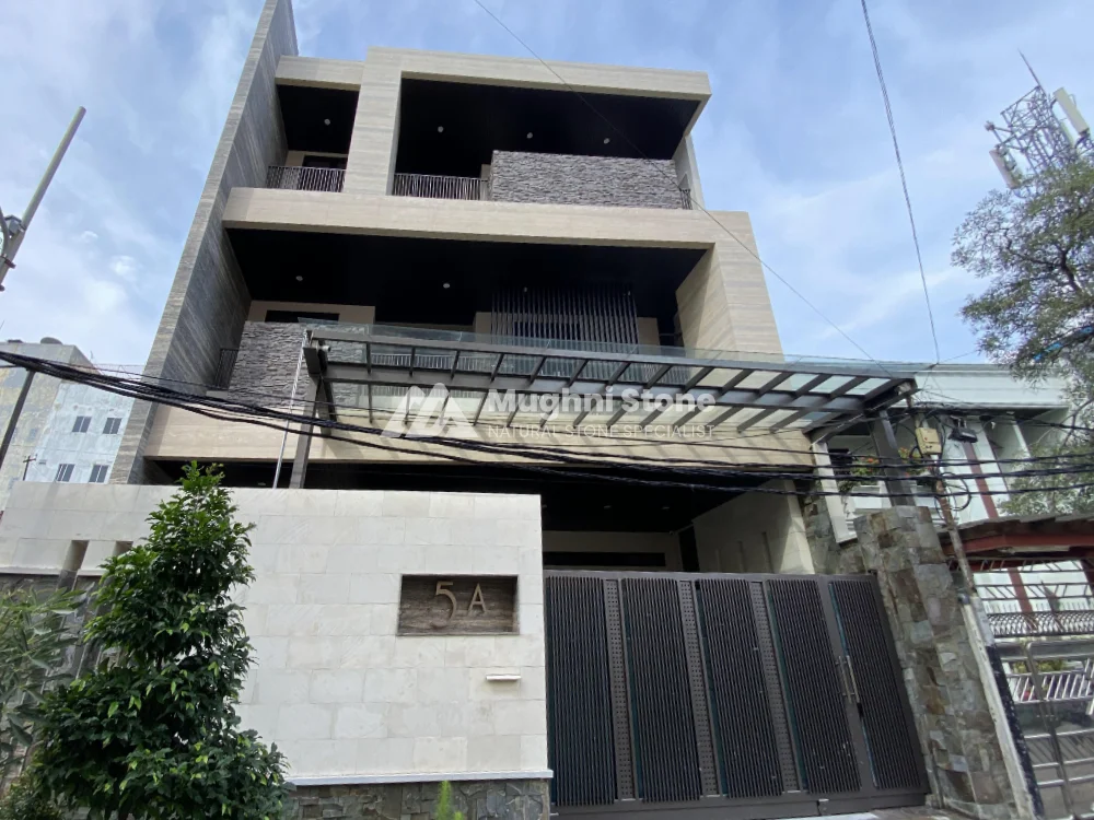 pemasangan batu alam andesit, paras dan purwakarta untuk dinding fasad rumah