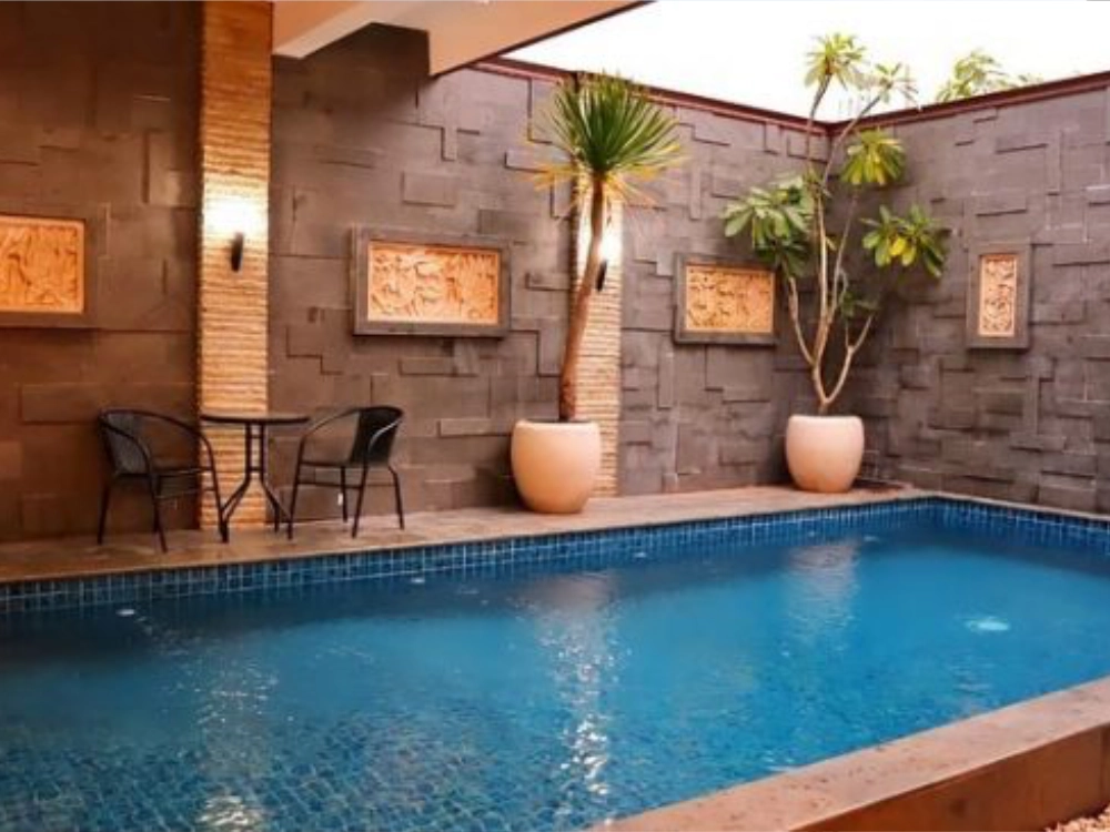 dinding kolam renang batu alam andesit