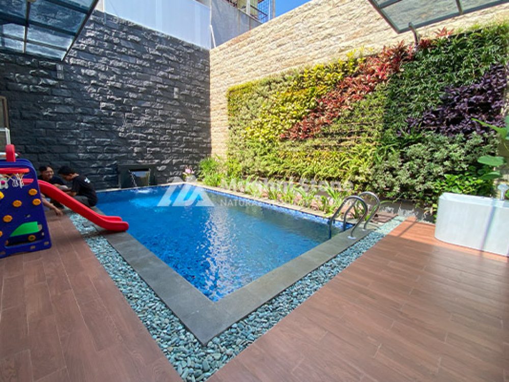 kolam renang minimalis batu alam